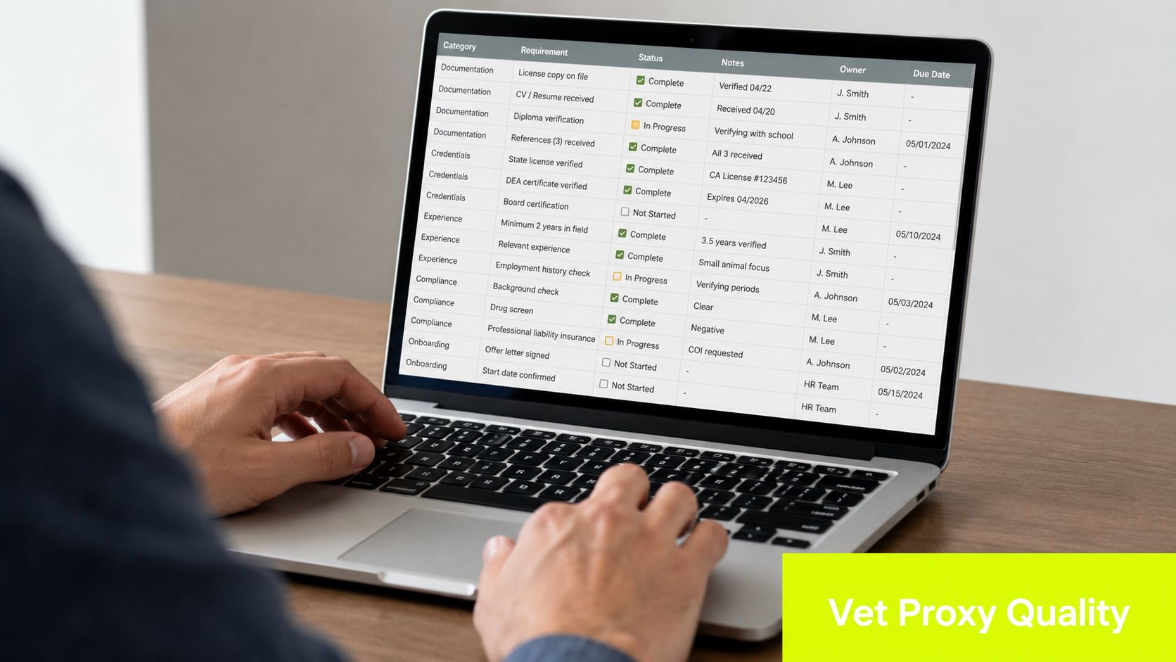 A person working on a laptop displaying a comprehensive veterinary compliance and onboarding checklist table.